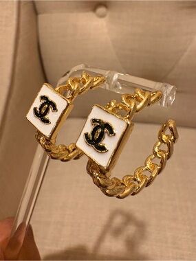 CHANEL Gold Hoop Earrings with White Enamel and Black CC